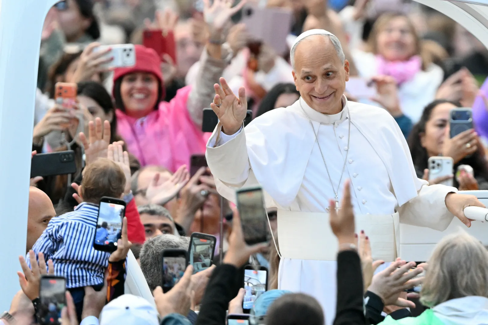 Pope Leo XIV greets the crowd during the weekly general audience at St Peter's Square in The Vatican on October 21, 2026. (Photo by Tiziana FABI / AFP via Getty Images)