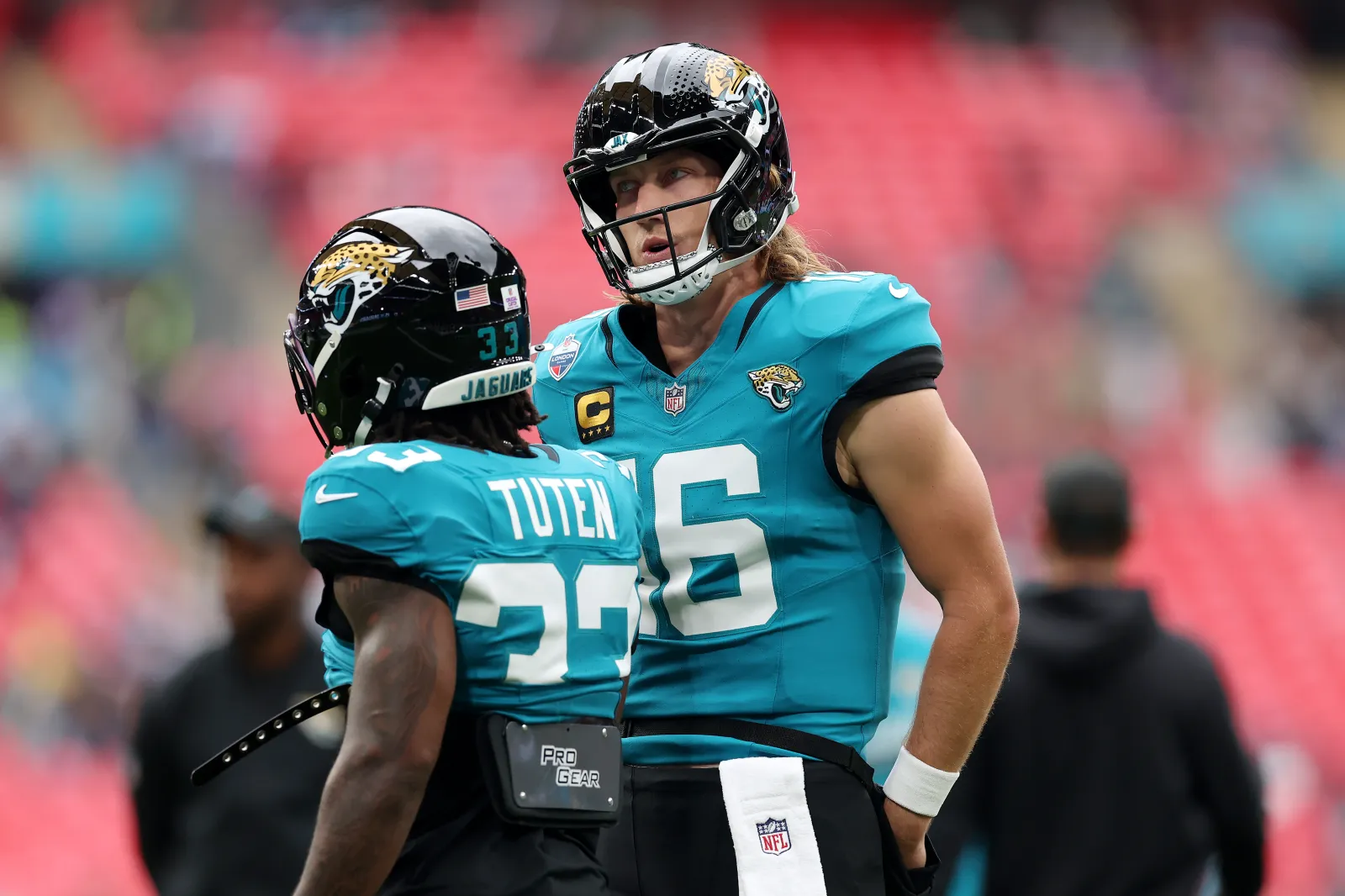 Trevor Lawrence and B hayshul Tuten of the Jacksonville Jaguars.