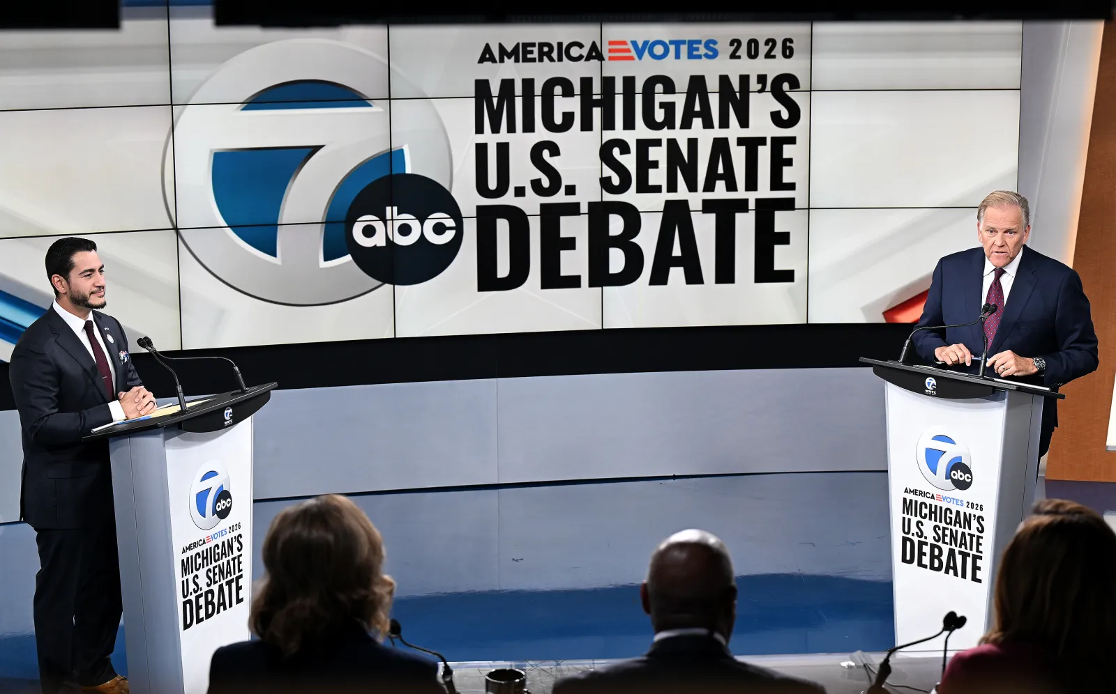 U.S. Senate candidates Democrat Abdul El-Sayed, left, and his Republican opponent, former Representative Mike Rogers, debate on October 21, 2026, at WXYZ in Southfield, Michigan.