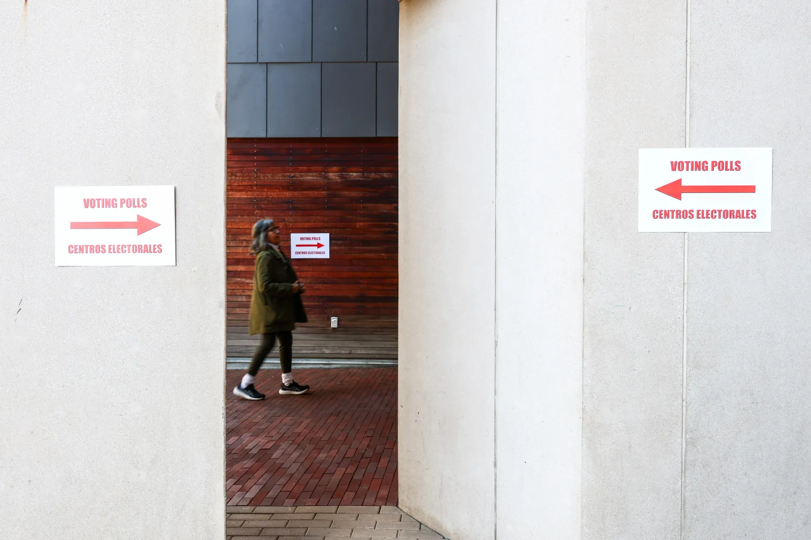A voter enters the polling center at the Silver Spring Civic Building on Thursday in Silver Spring, Maryland.
