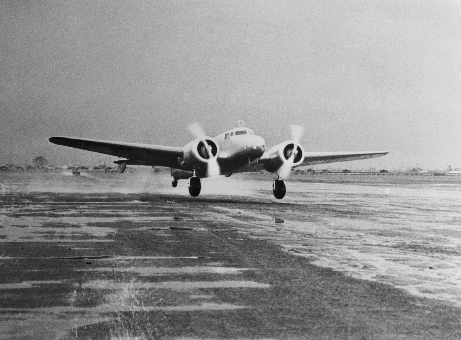 This photo shows Amelia Earhart's Lockheed Electra taking off from Oakland Airport at Alameda, California, on the first leg of her proposed world spanning flight.