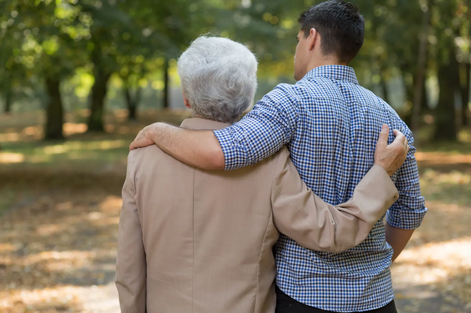 Stock image of two people embracing.