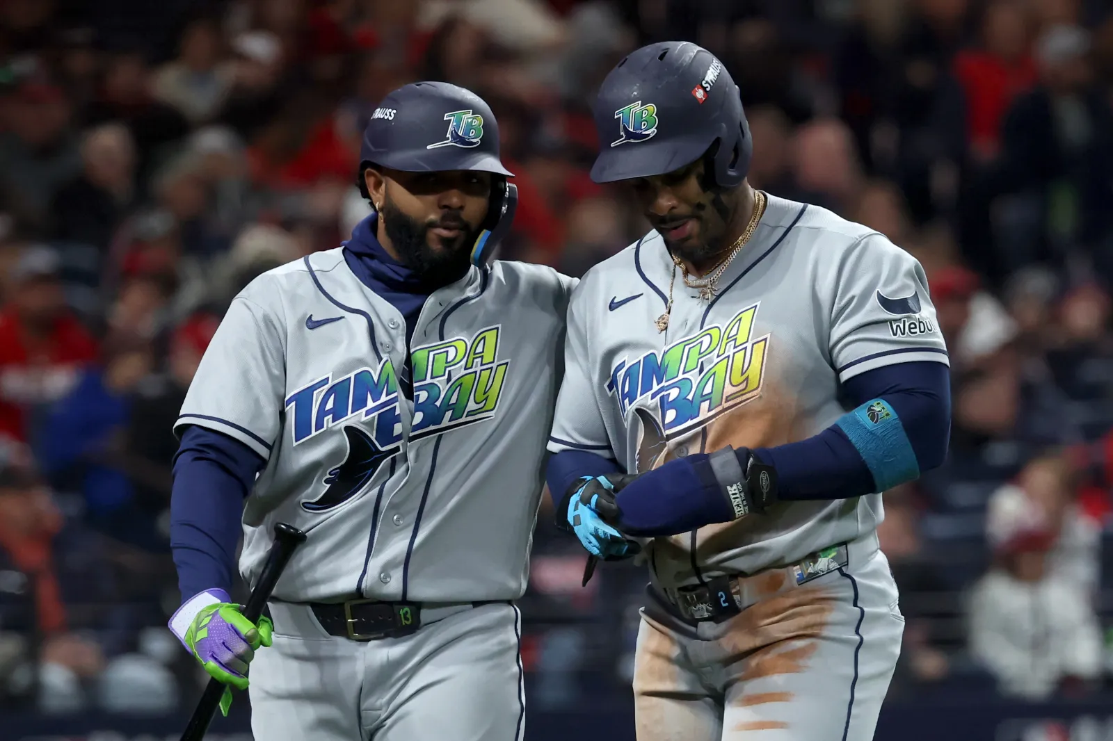 CLEVELAND, OHIO - OCTOBER 17: Yandy Díaz #2 of the Tampa Bay Rays reacts with Junior Caminero #13 after scoring a run during the third inning against the Cleveland Guardians in game four of the American League Championship Series at Progressive Field on October 17, 2026 in Cleveland, Ohio. (Photo by Gregory Shamus/Getty Images)