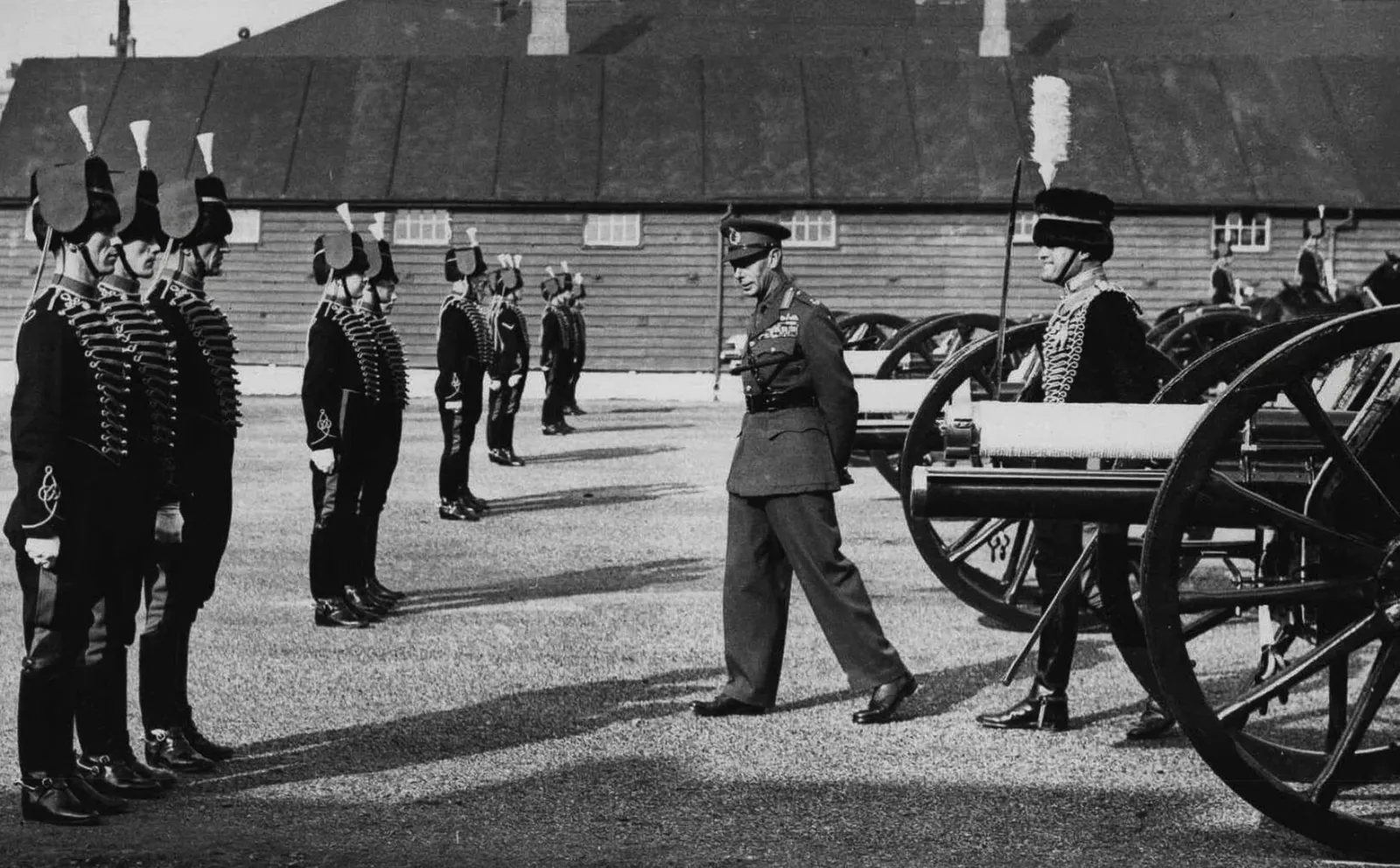 An image of King George VI during his visit of the St. John's Wood barracks.