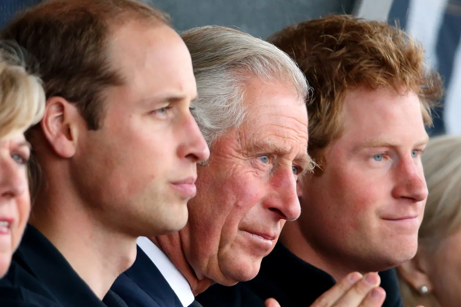 Prince William, King Charles III and Prince Harry watch the athletics during the Invictus Games at the Lee Valley Athletics Centre, in London, on September 11, 2014.