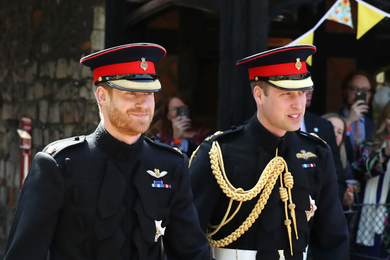 Prince Harry and Prince William arrive at St George's Chapel, Windsor Castle, on May 19, 2018 for Harry's wedding to Meghan Markle.
