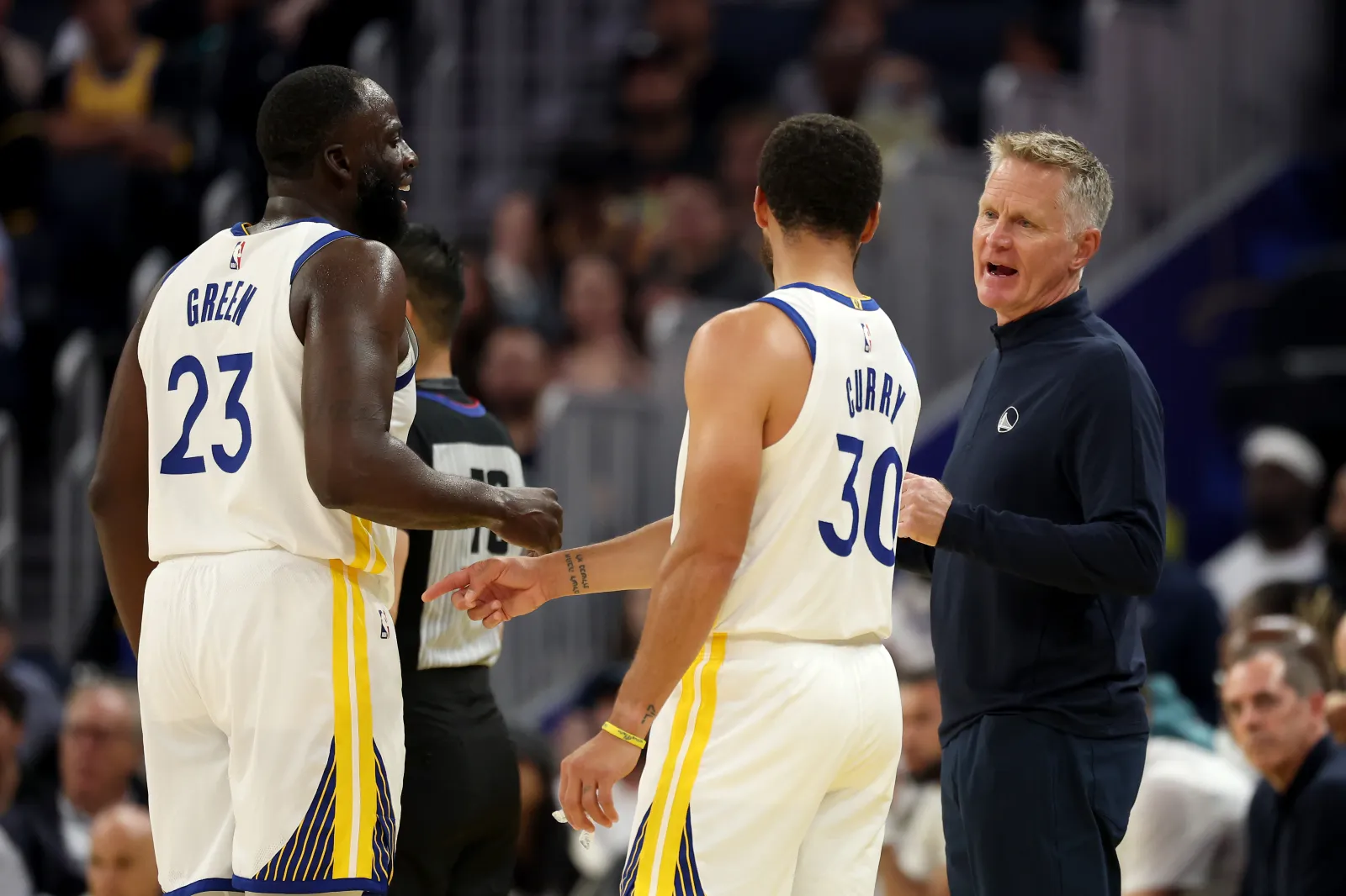 Golden State Warriors forward Draymond Green, guard Stephen Curry and head coach Steve Kerr