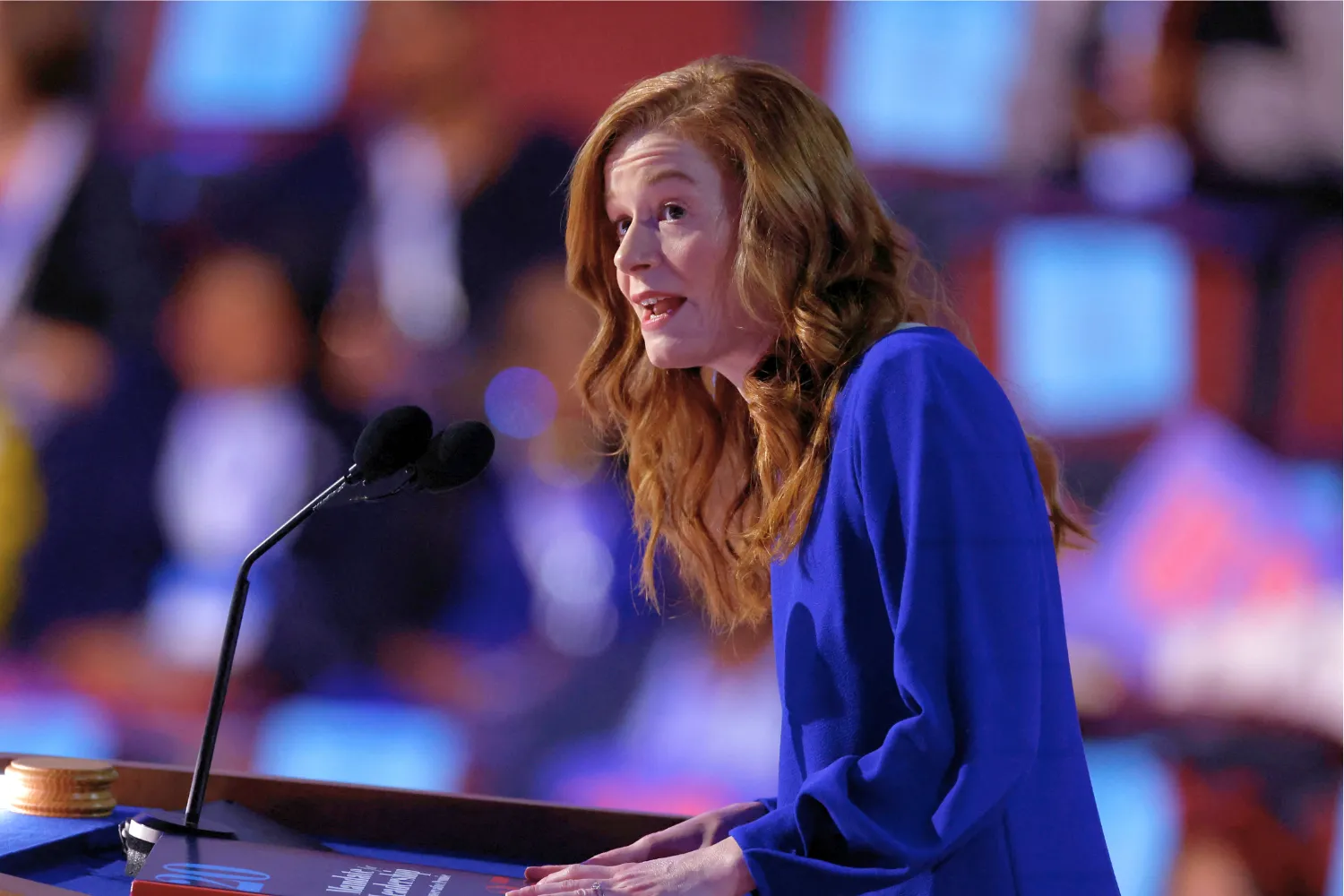 Mallory McMorrow speaks on stage with a copy of the Heritage Foundation's "Mandate for Leadership," in Chicago, Illinois, on August 19, 2024.